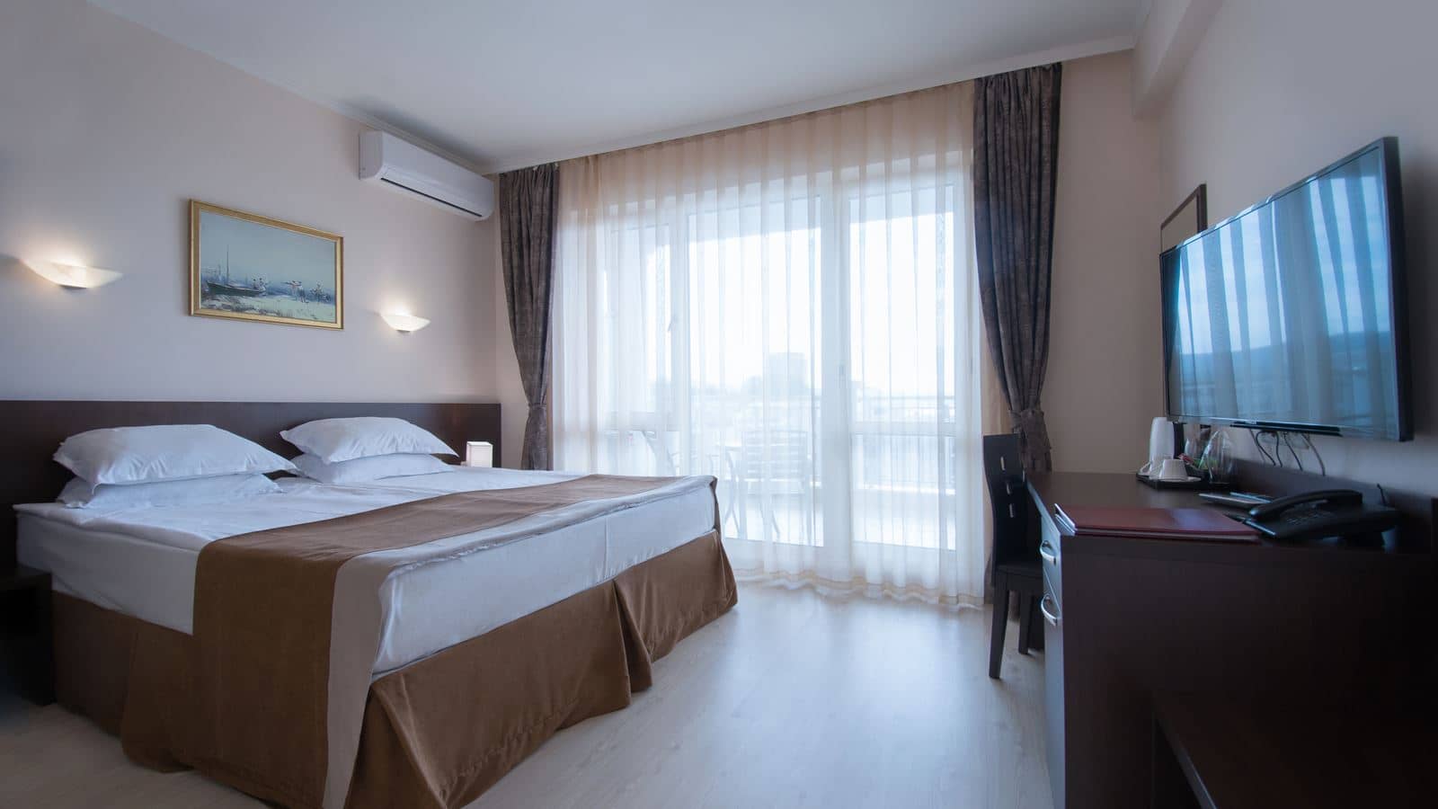 rooms-2-bedroom-deluxe-apartment-seaview-balcony-or-terrace