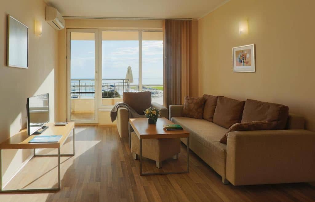 rooms-standard-apartment-poolview-balcony-or-terrace