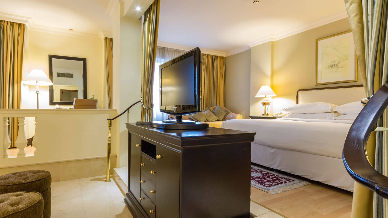 rooms-executive-room-our-executive-suites-are-stunning-and-show-attention-to-details-in-every-aspect-elevates-you-to-a-higher-level-of-suite-experience-indulge-yourself-with-our-fifty-eight-square-meters-suite-with-an-impressively-grand-bathroom-suited-for-traveler-requiring-the-highest-standards-lcd-flat-screen-tv-kind-size-bed-and-spacious-living-room-you-will-feel-like-a-royalty-when-staying-in-this-suite-and-will-find-that-all-your-needs-have-been-met-with-our-tasteful-and-sophisticated-inclusions