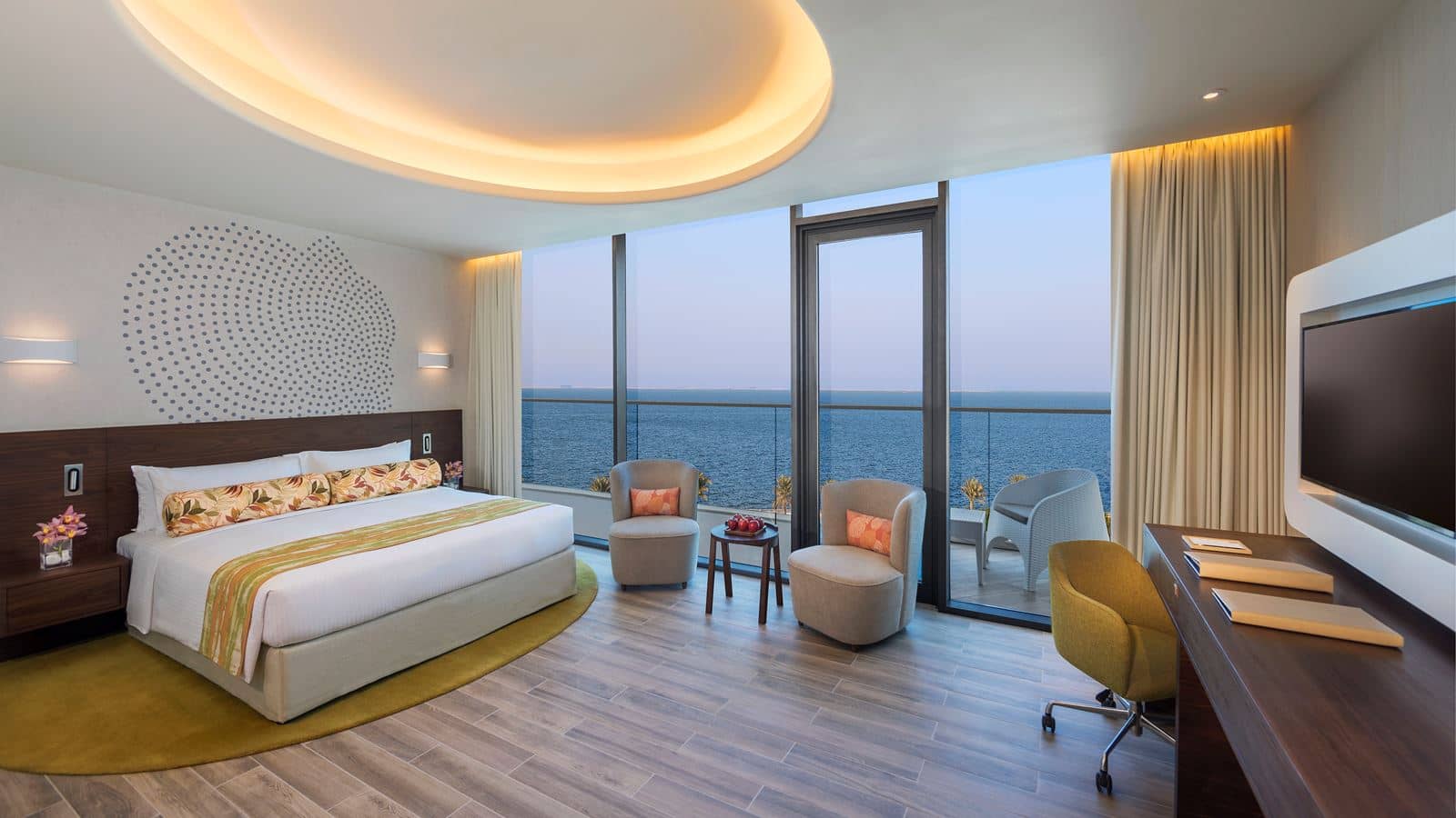 rooms-deluxe-room-with-balcony-partial-palm-sea-view