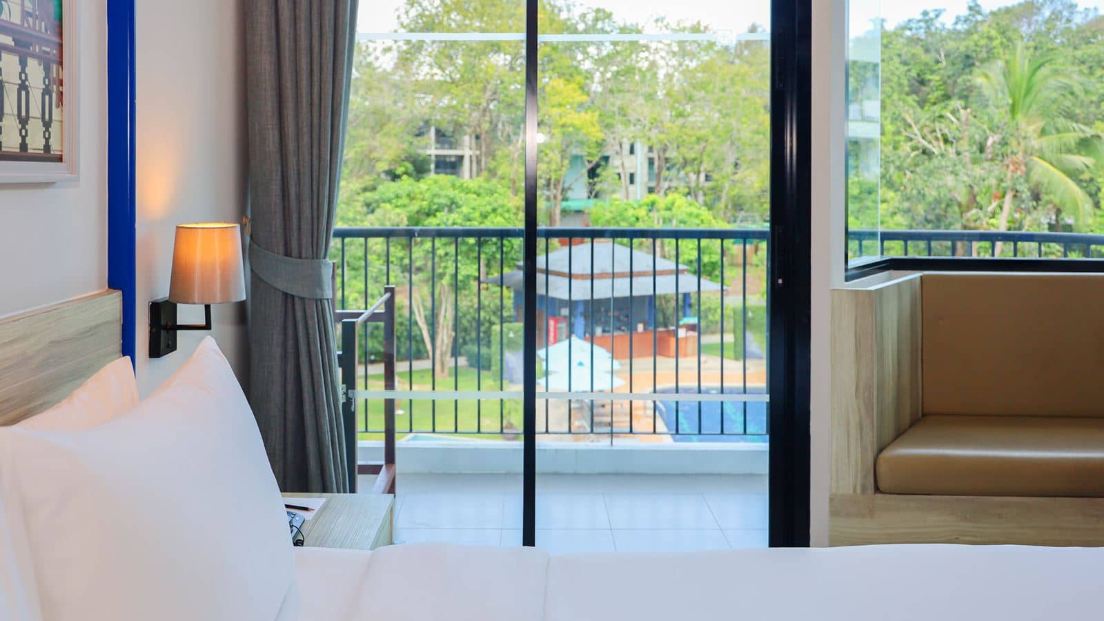 rooms-two-bedroom-family-pool-view-suite-child-sharing-bed