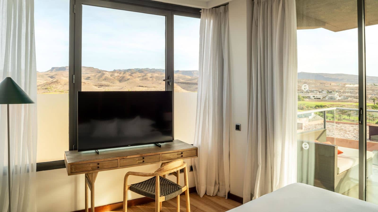 rooms-deluxe-suite-with-mountaingolf-view-balcony-or-terrace