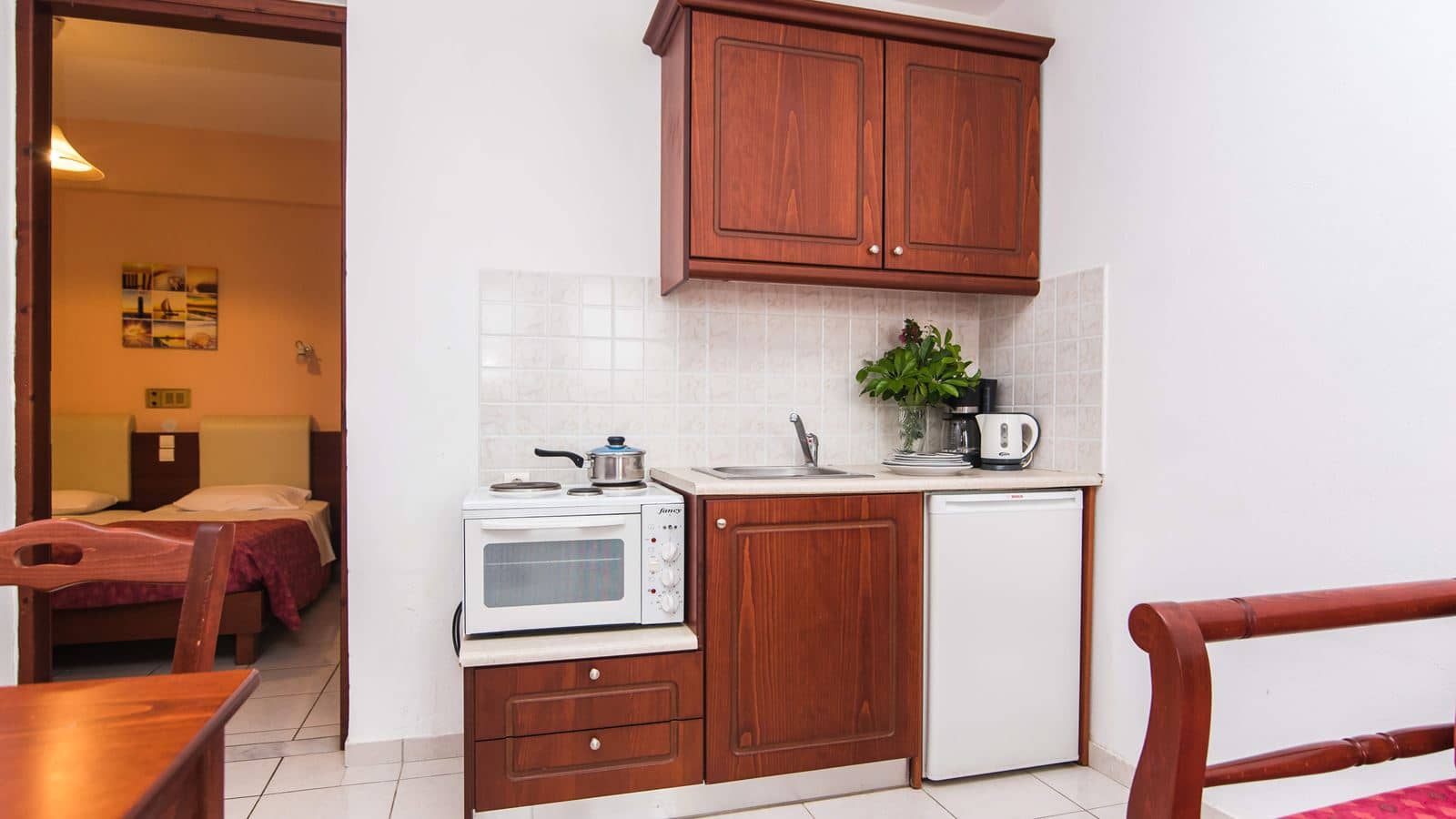 rooms-one-bedroom-apartment-garden-view-or-side-sea-view-4-pax