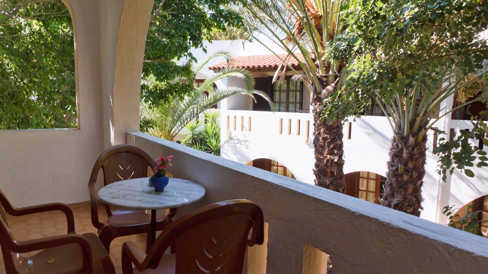 rooms-bungalow-standard-triple-gardenview-balcony-or-terrace