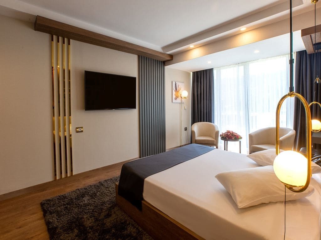 rooms-junior-suite-1+1-balkonlu-bahce-manzarali