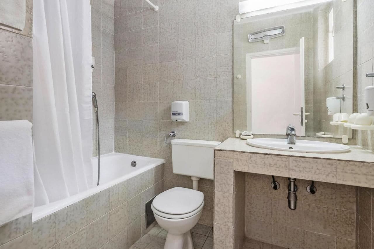 rooms-1-bedroom-deluxe-apartment-seaside-balcony-or-terrace