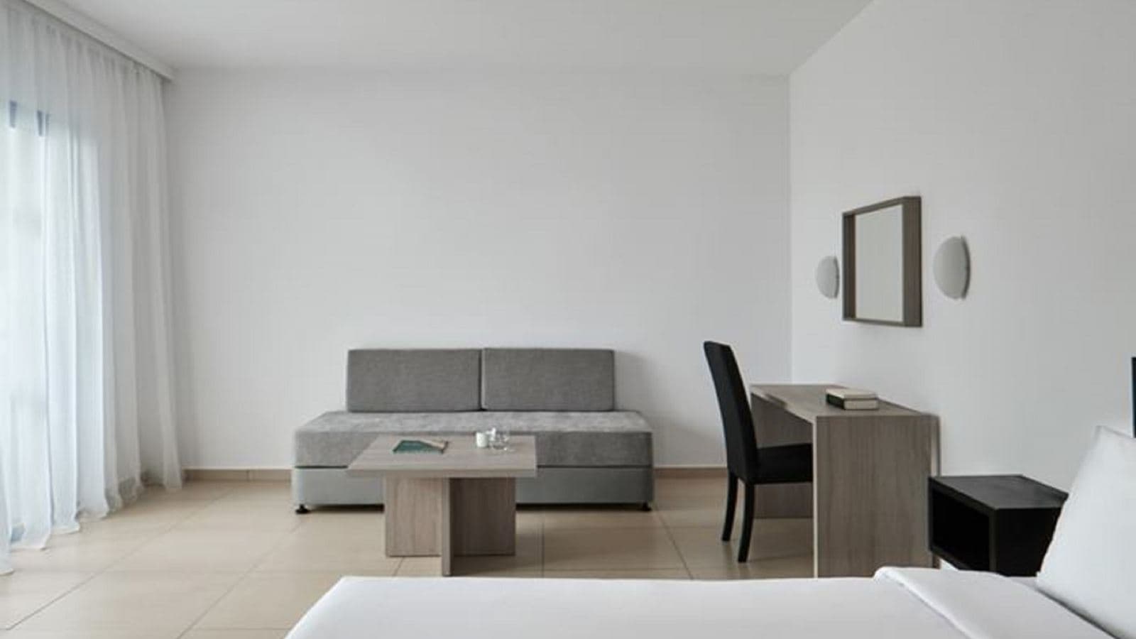 rooms-studio-standard-double-gardenview-balcony-or-veranda