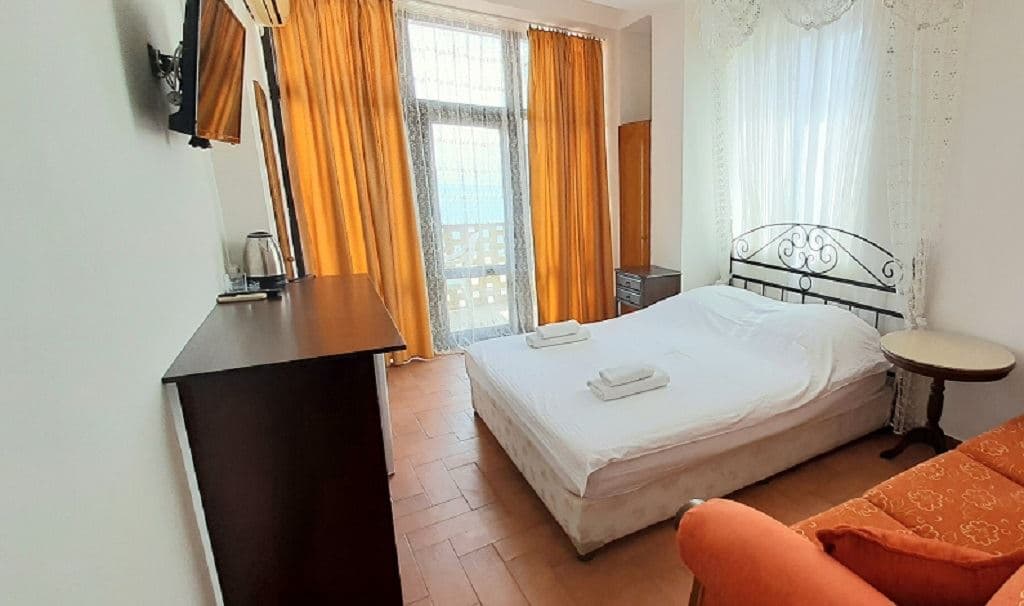 rooms-2bed-superior-with-balcony-view-of-the-neighboring-building