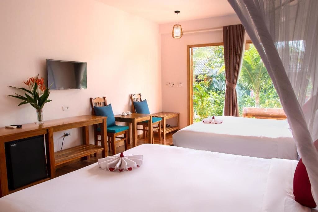 rooms-superior-triple-gardenview-with-balcony