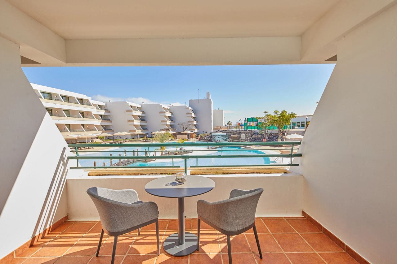 rooms-double-pool-view-balcony-or-terrace