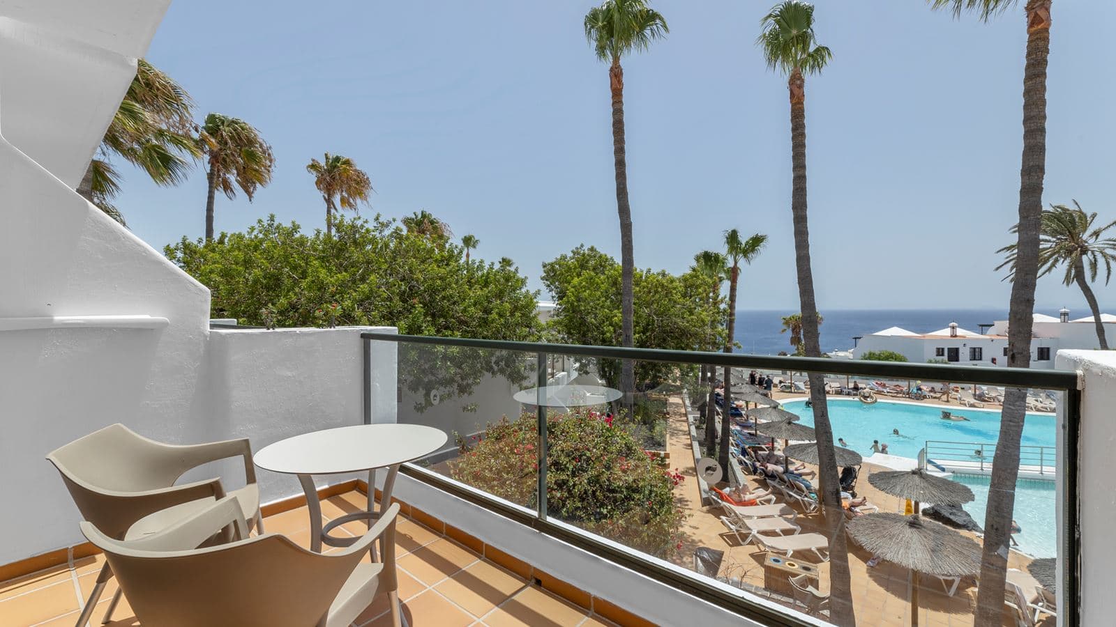 rooms-junior-suite-poolview-balcony-or-terrace