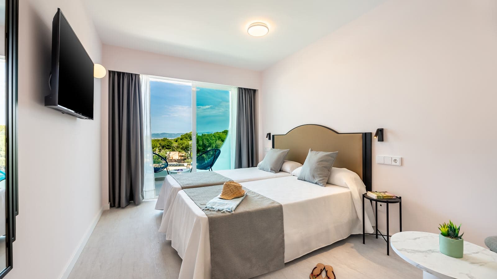 rooms-twin-room-pool-view-balcony-or-terrace
