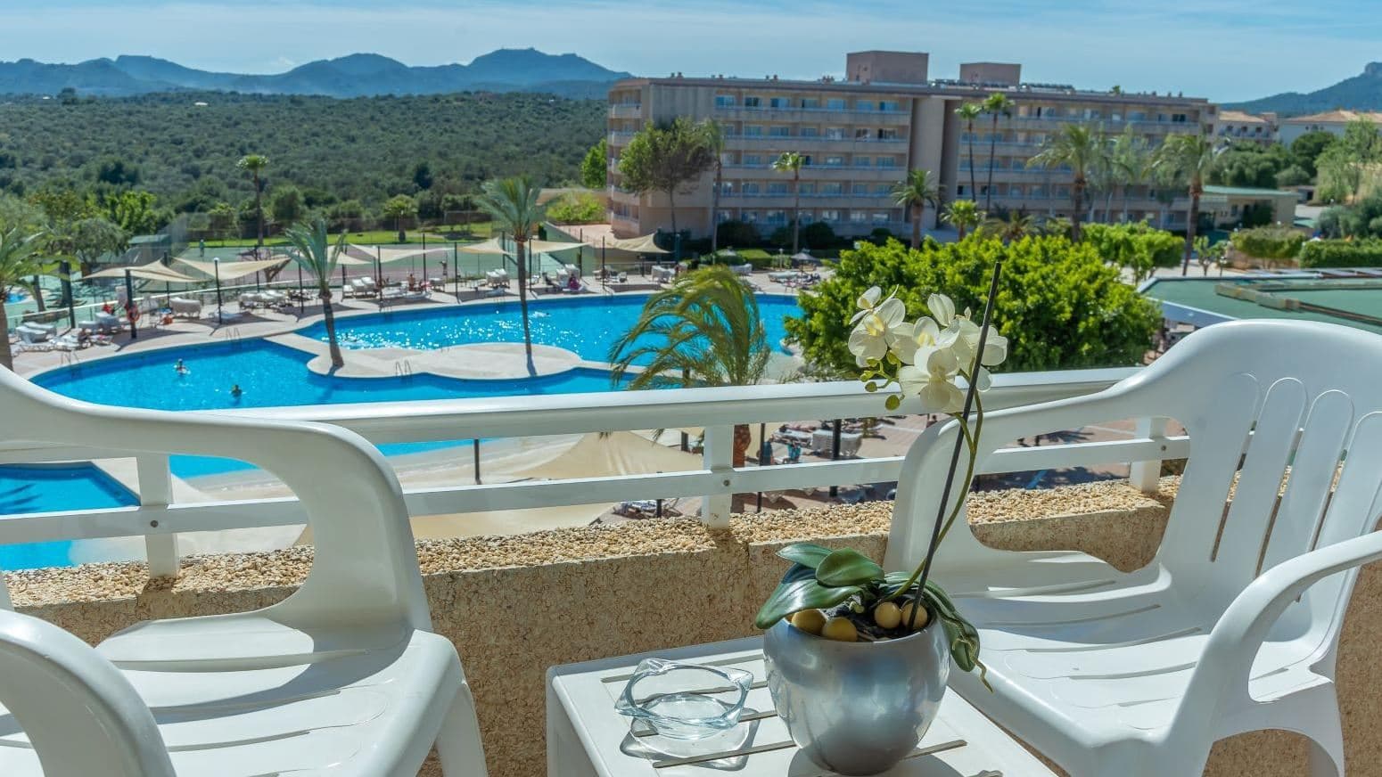 rooms-dp--twin-poolgarden-view-balcony-or-terrace