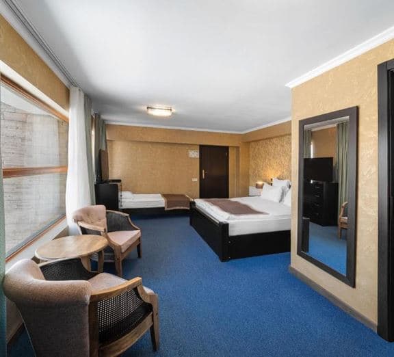 DELUXE TRIPLE WITH BALCONY Номера
