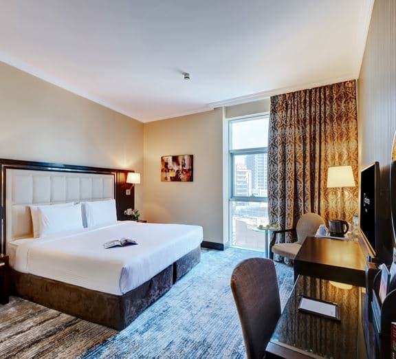 Deluxe One Bedroom Suite City View Номера