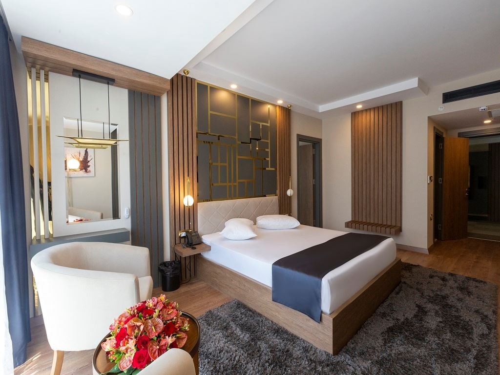 rooms-junior-suite-1+1-balkonlu-bahce-manzarali