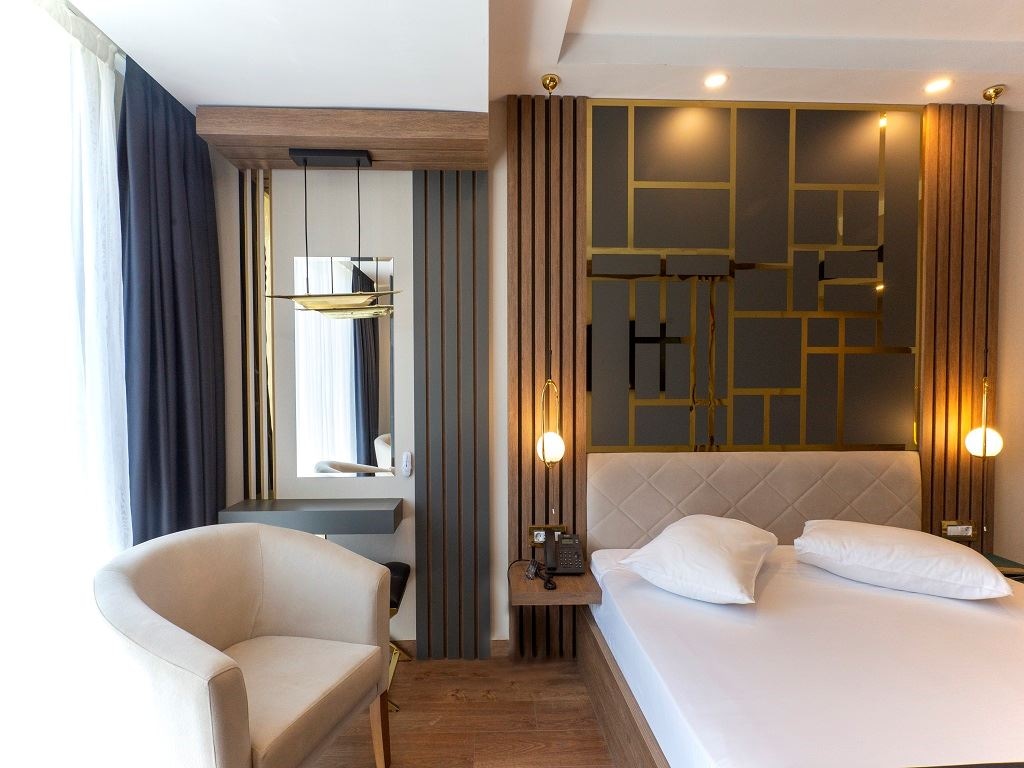 rooms-junior-suite-1+1-balkonlu-bahce-manzarali