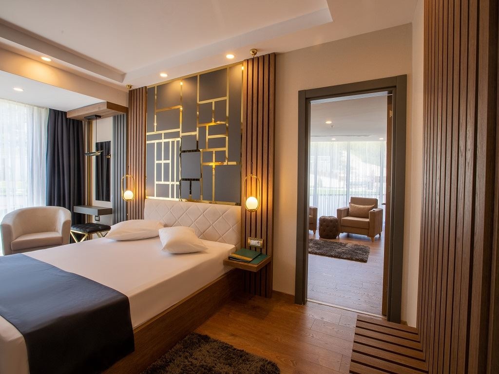 rooms-junior-suite-1+1-balkonlu-bahce-manzarali