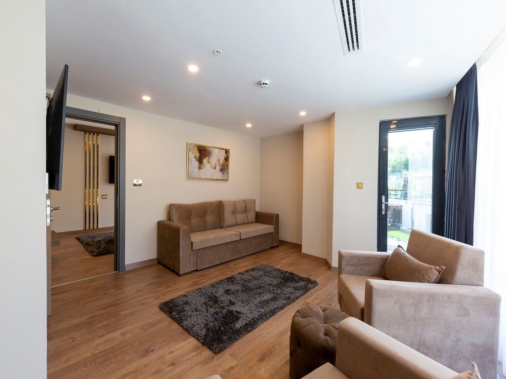 rooms-junior-suite-1+1-balkonlu-bahce-manzarali