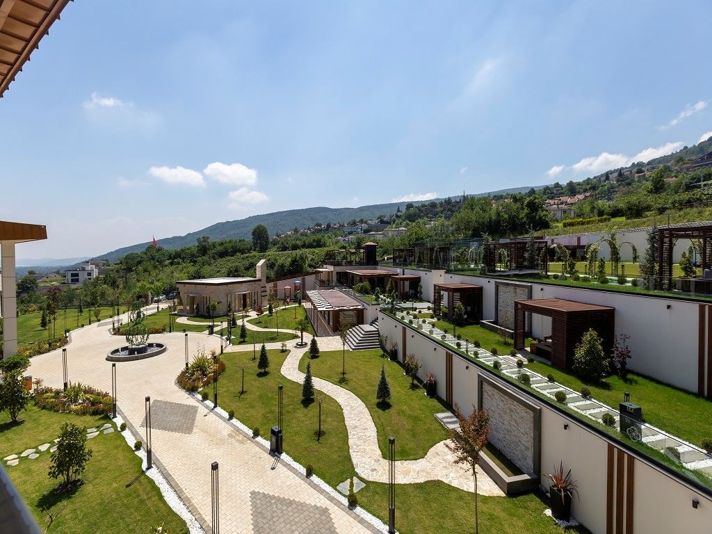 rooms-junior-suite-1+1-balkonlu-bahce-manzarali