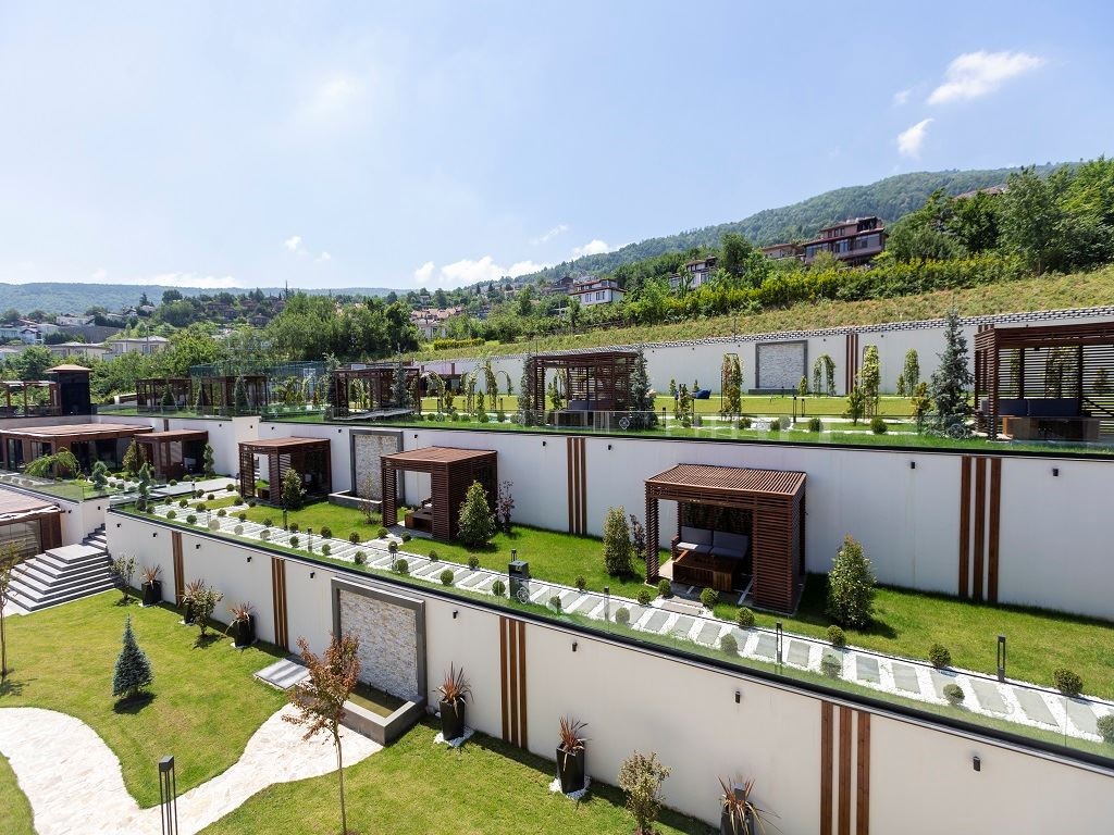 rooms-junior-suite-1+1-balkonlu-bahce-manzarali