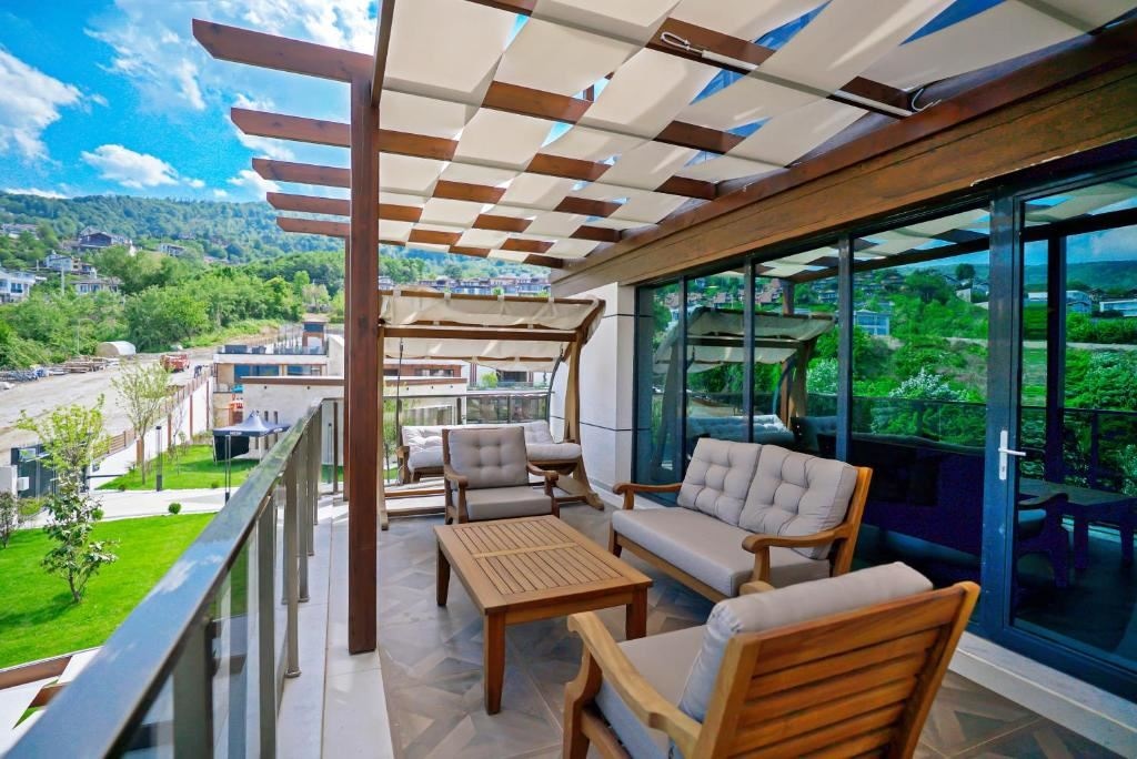 rooms-executive-suite-1+1-bahce-ve-teras-gol-manzarali