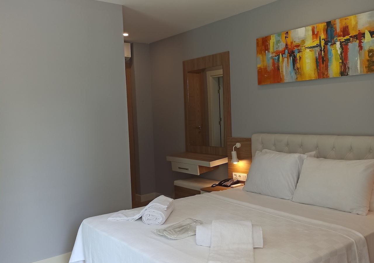 rooms-ekonomik-bahce-manzarali-oda