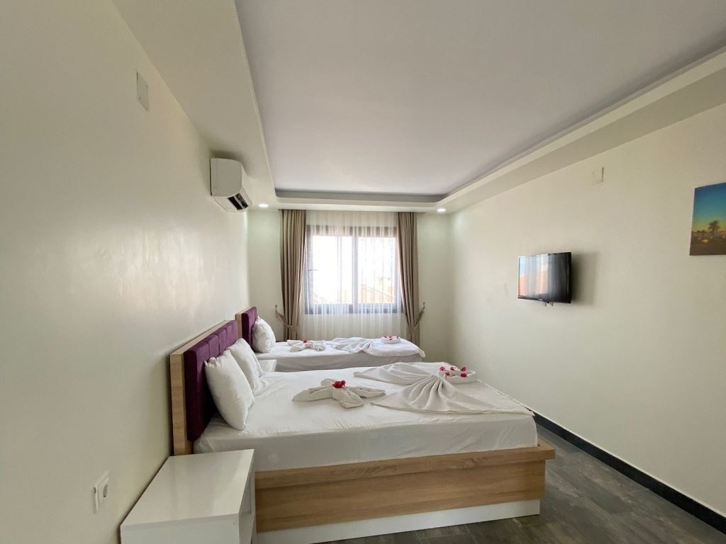 rooms-uc-kisilik-oda