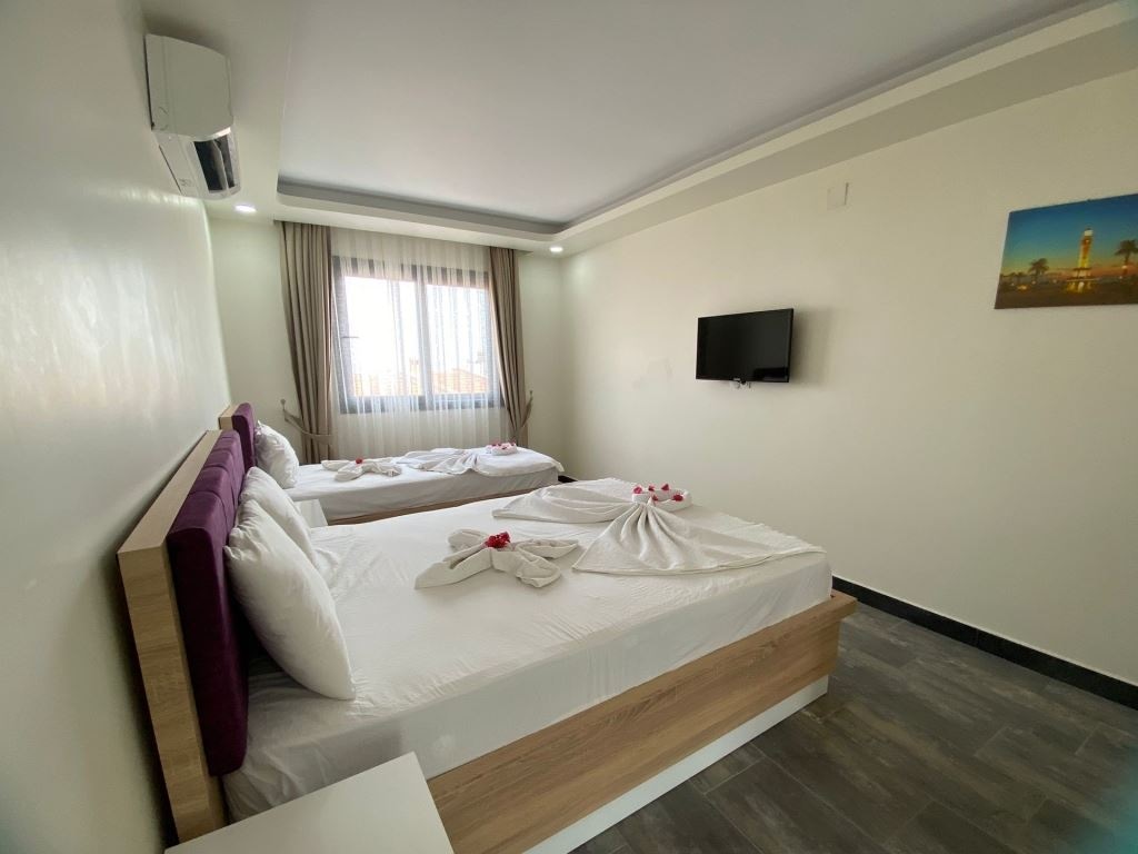 rooms-uc-kisilik-oda