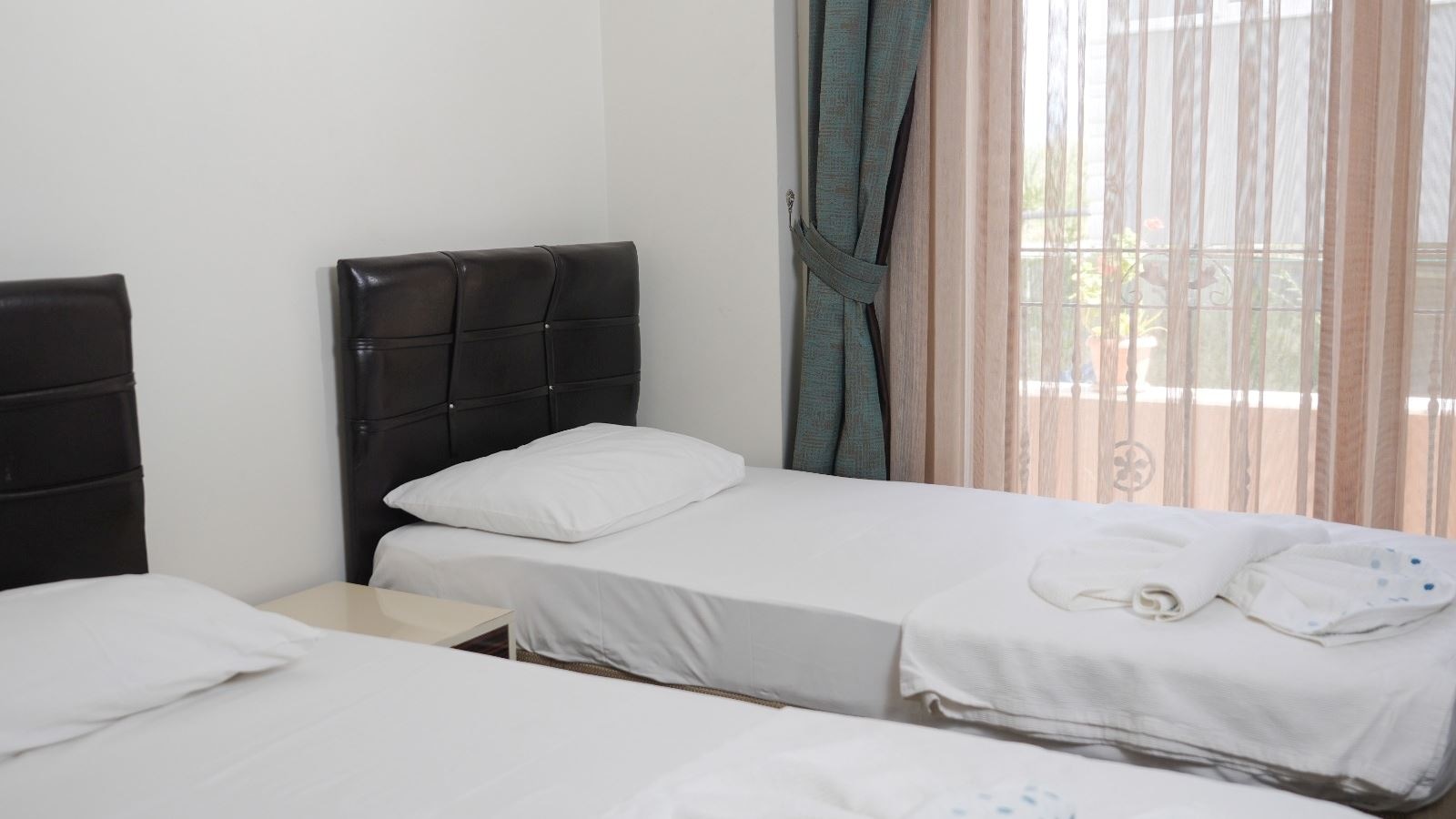 rooms-uc-kisilik-oda