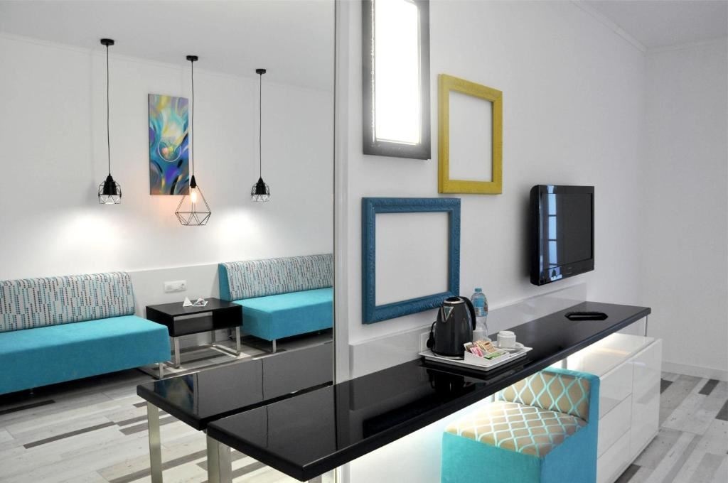 rooms-standard-family-room-sea-view-balcony-or-terrace