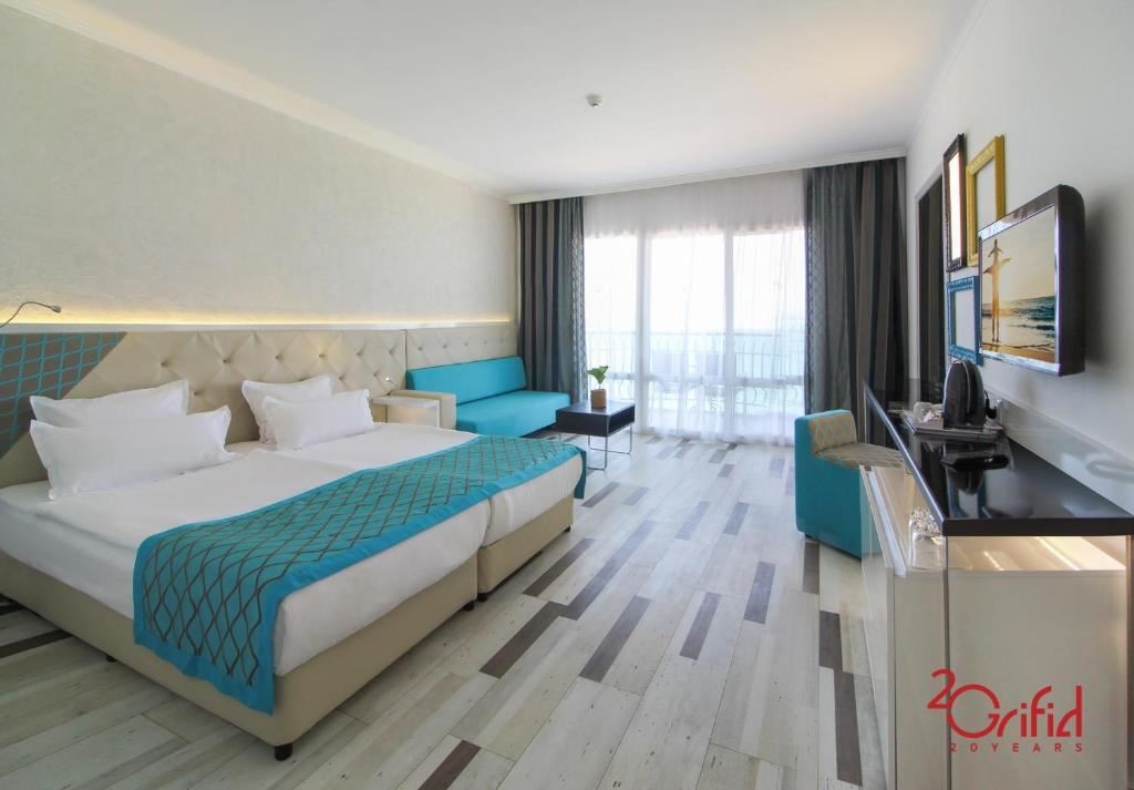 rooms-twin-standard-room-lateral-sea-view-balcony-or-terrace