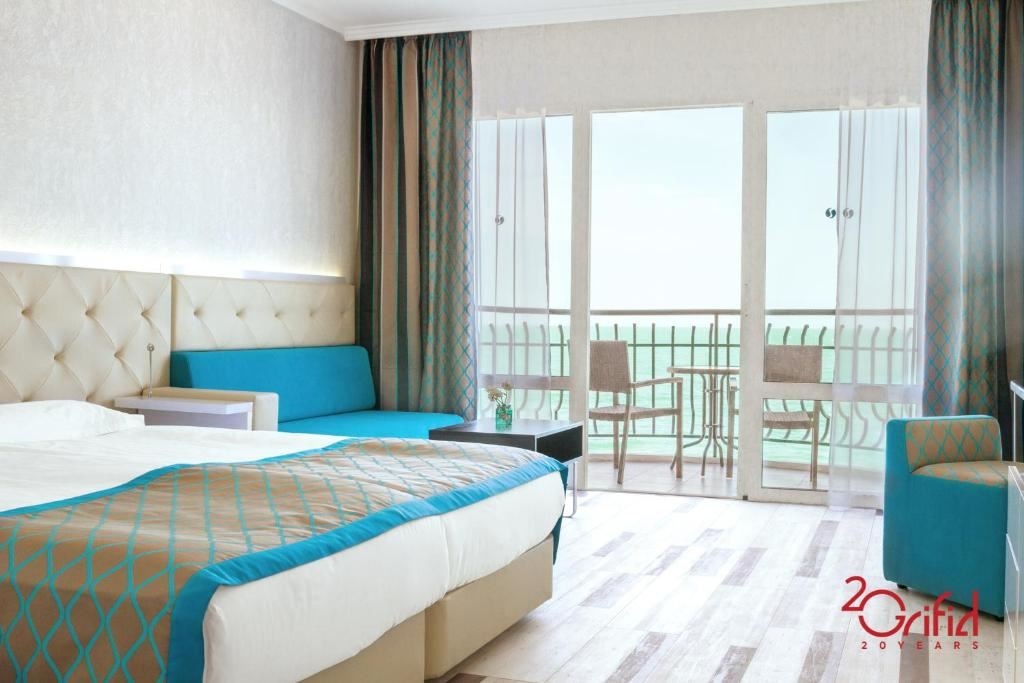 rooms-twin-standard-room-sea-view-balcony-or-terrace