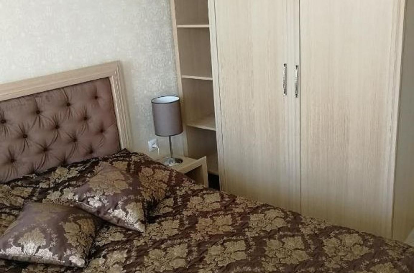 rooms-1-bedroom-deluxe-apartment-balcony