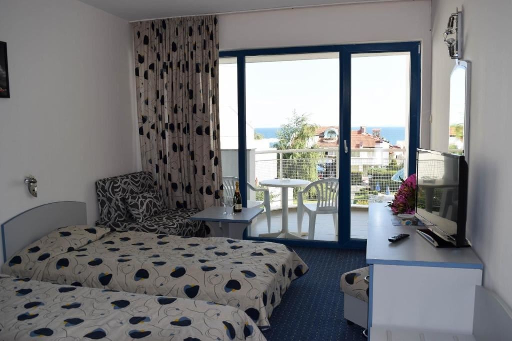 rooms-twin-standard-room-seaview-balcony-or-terrace