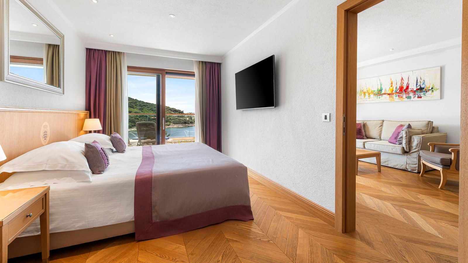 rooms-1-bedroom-deluxe-apartment-seaview-balcony