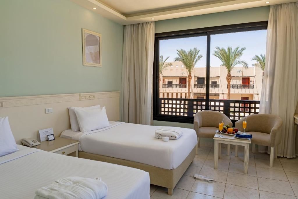 rooms-deluxe-room-garden--pool-view-refreshed-rooms