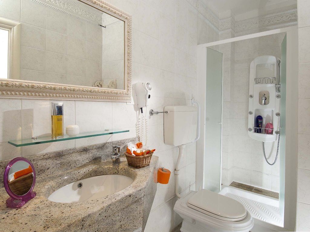 rooms-economy-room-lateral-sea-view-with-balcony