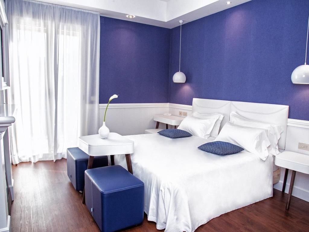 rooms-liberty-room-lateral-sea-view-with-balcony