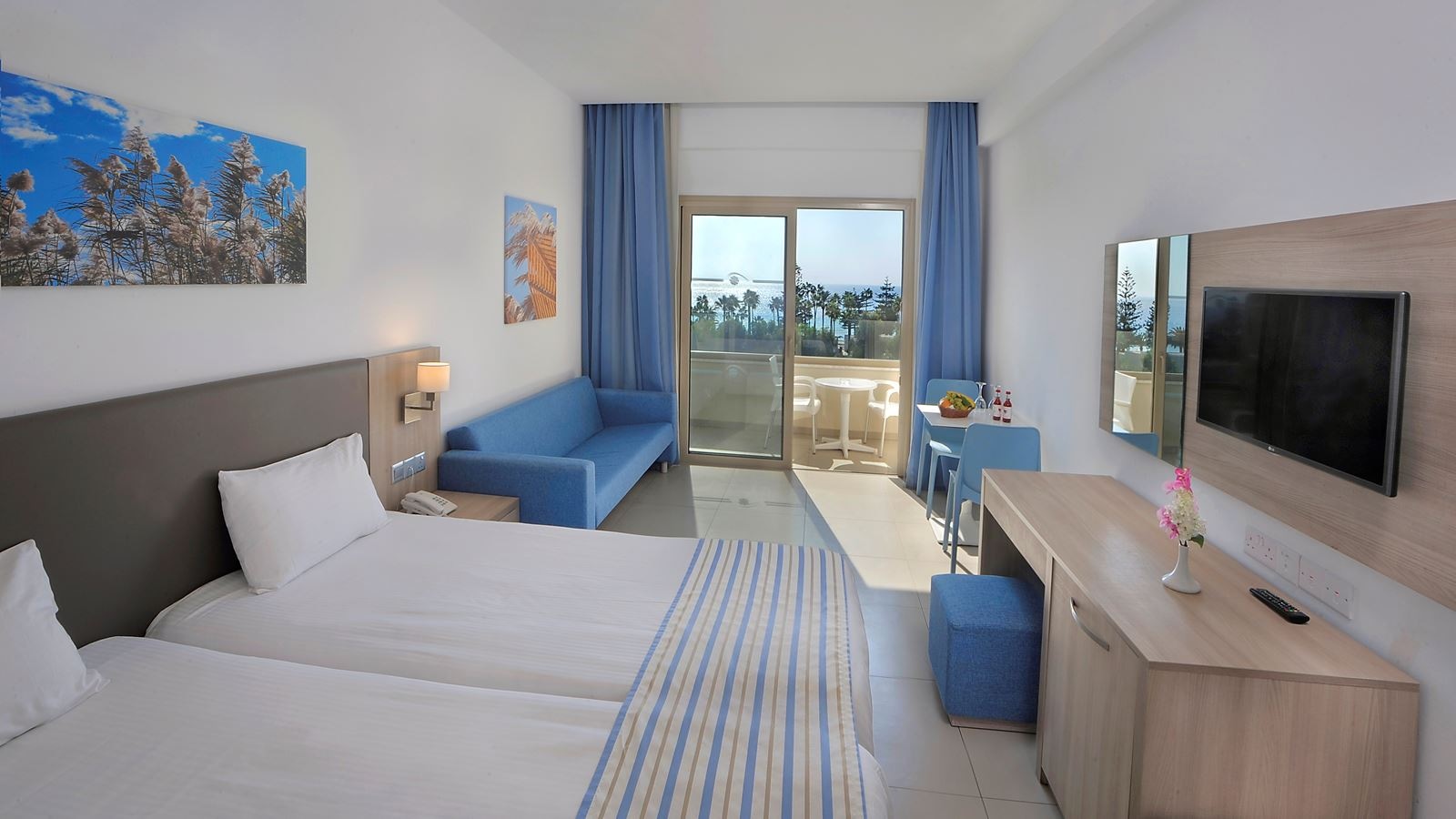 rooms-superior-familyroom-inland-view-balcony