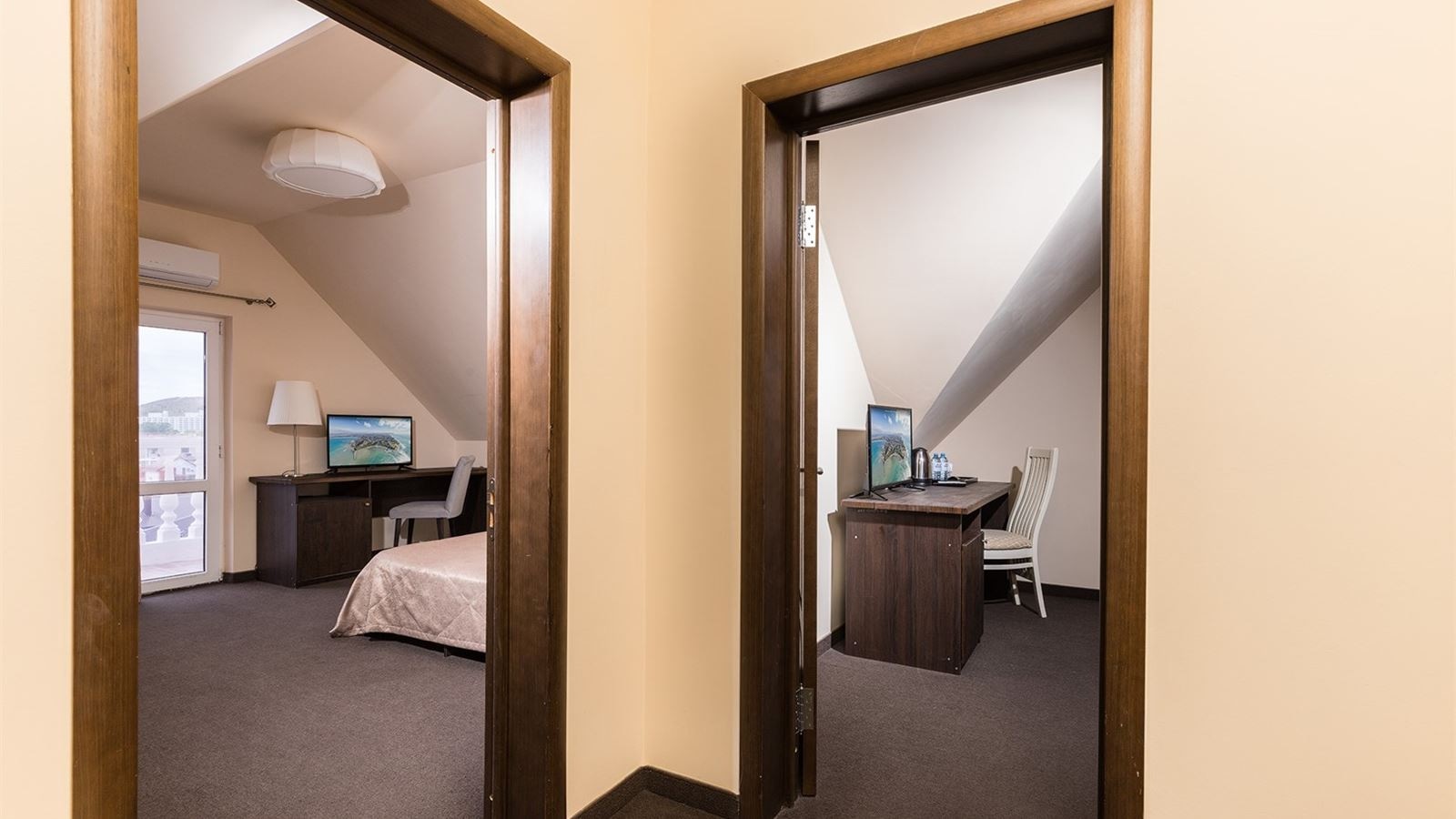 rooms-family-room-mansard-with-balcony