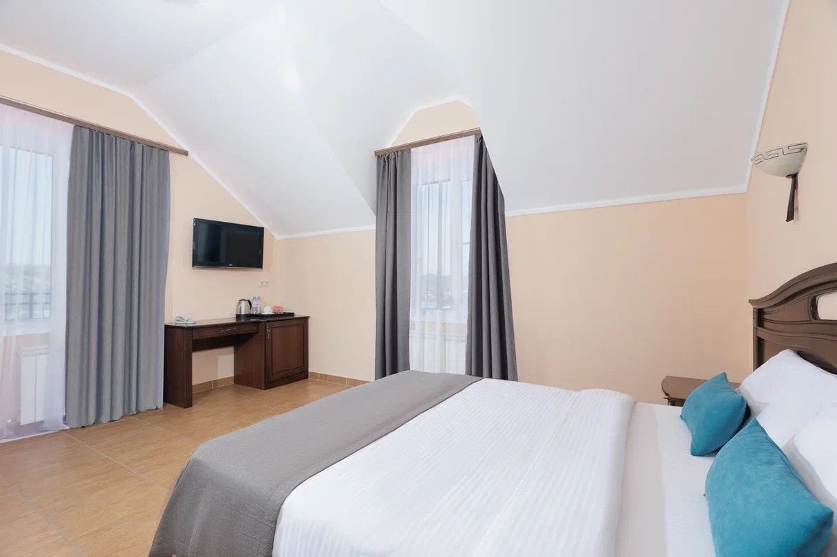 rooms-connect-standard-mansard-with-balcony-nirvana