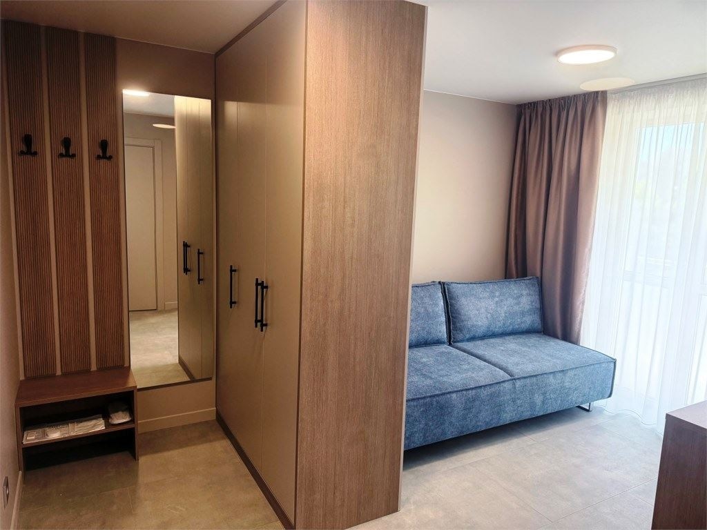 rooms-sing-superior-with-sofa