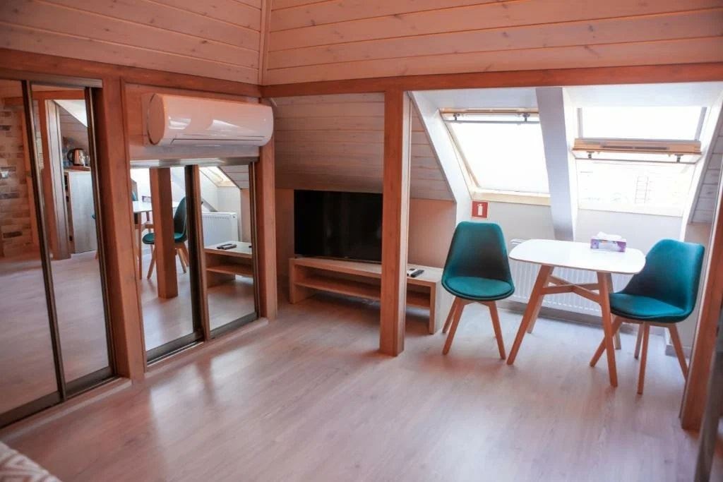 rooms-2bed-room-with-mansard-roof-and-sea-view