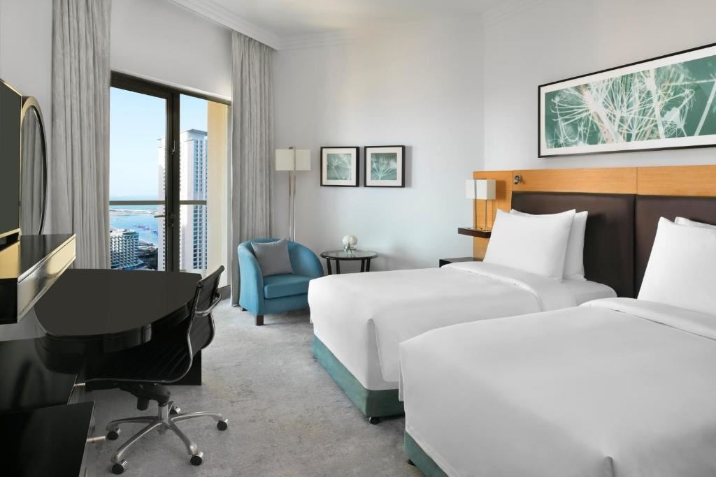 rooms-deluxe-room-partial-sea-view-with-balcony