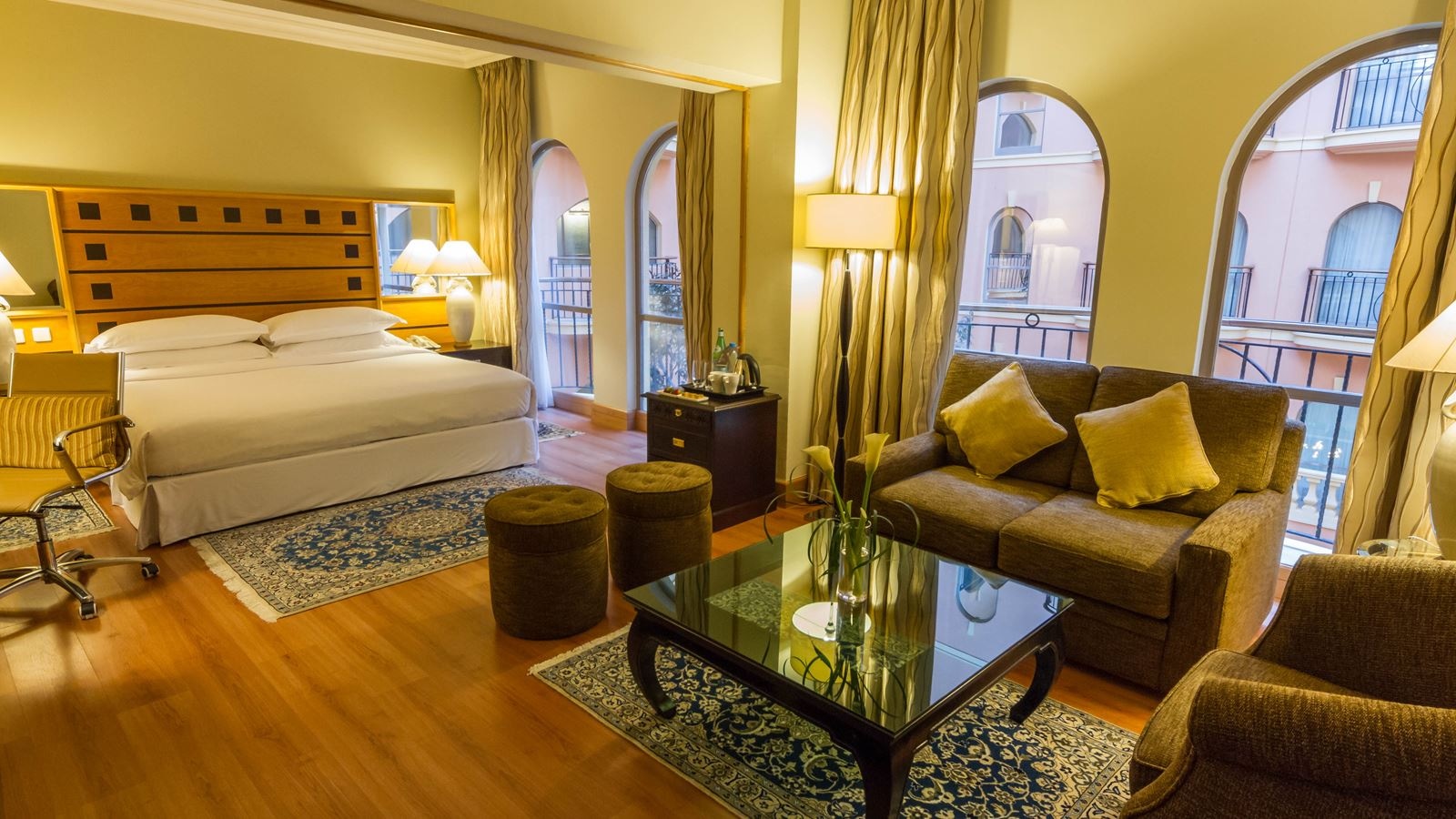 rooms-junior-suiteif-you-are-needing-more-than-just-a-bedroom-and-desire-space-and-luxury-the-junior-suite-is-perfect-for-you-enjoy-over-our-fifty-square-meters-of-space-with-large-and-comfortable-bedroom-and-living-room-each-suite-features-a-very-spacious-living-room-with-fine-furnishings-very-comfortable-work-area-with-flat-screen-tv-to-help-your-relax-after-busy-day-and-large-bathroom-to-create-more-relaxing-bath-time