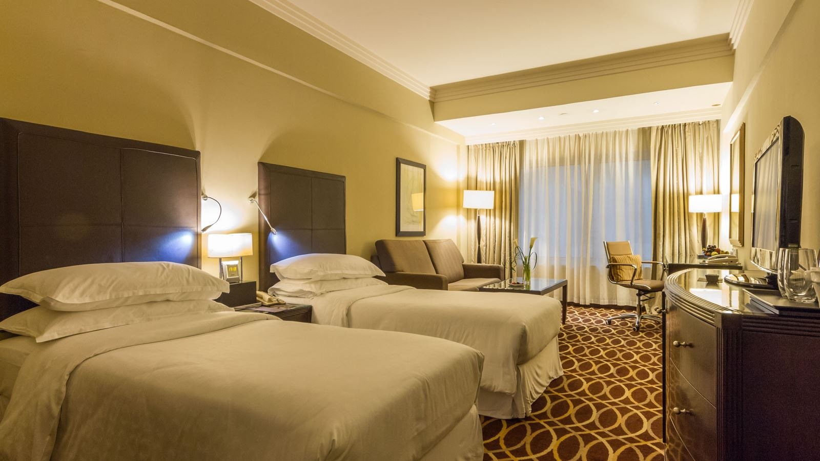 rooms-classic-room-relax-and-enjoy-your-stay-in-thirty-square-meters-space-designed-to-feel-just-like-home-each-room-features-a-king-or-twin-size-beds-invites-you-to-tuck-in-for-a-good-sleep-generous-working-desk-wirless-internet-access-flat-screen-tv-air-condtion-complete-with-an-ensuite-bathroom-and-other-top-line-room-amenities