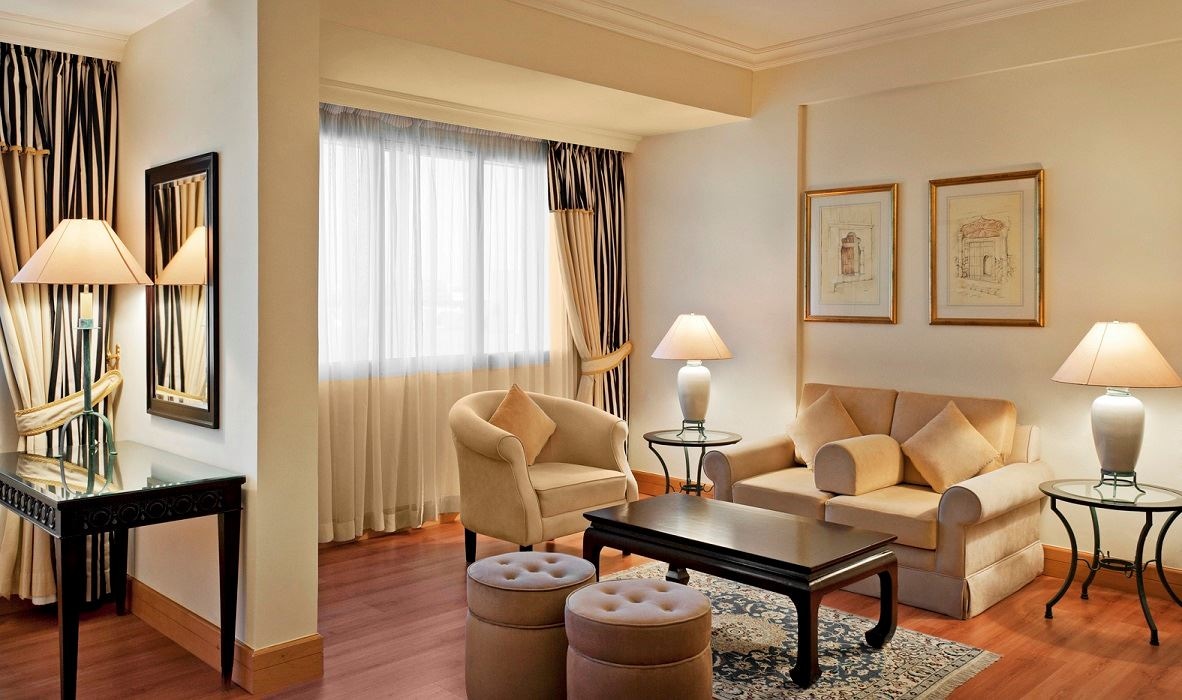 rooms-junior-suiteif-you-are-needing-more-than-just-a-bedroom-and-desire-space-and-luxury-the-junior-suite-is-perfect-for-you-enjoy-over-our-fifty-square-meters-of-space-with-large-and-comfortable-bedroom-and-living-room-each-suite-features-a-very-spacious-living-room-with-fine-furnishings-very-comfortable-work-area-with-flat-screen-tv-to-help-your-relax-after-busy-day-and-large-bathroom-to-create-more-relaxing-bath-time