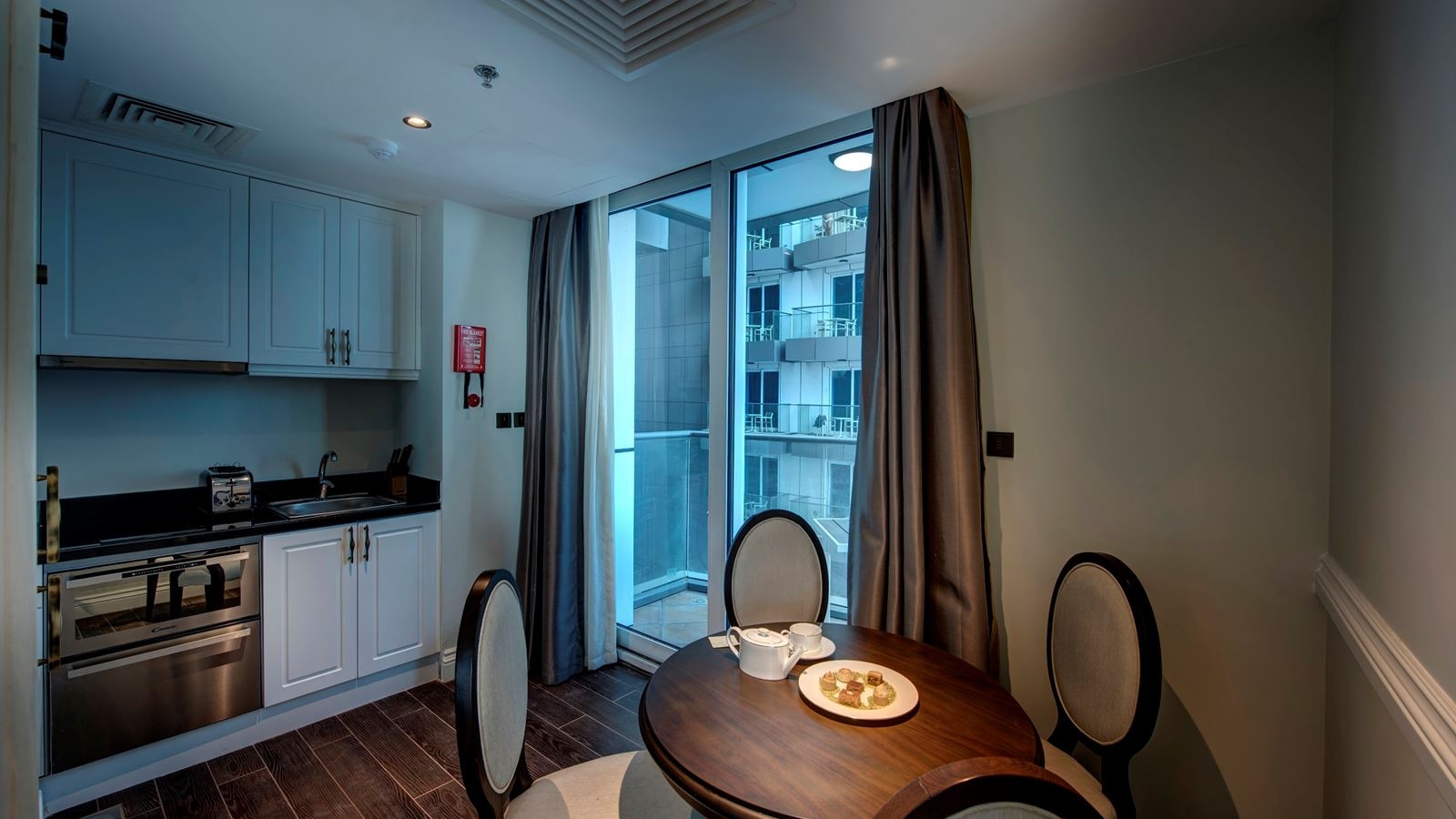 rooms-grand-studio-city-view-or-partial-sea-view