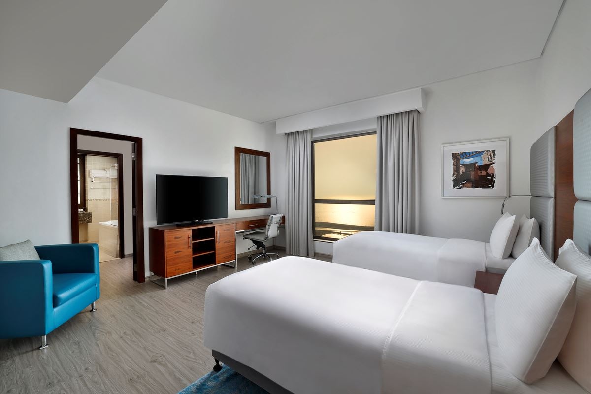 rooms-four-bedroom-family-suite-sea-view-with-balcony